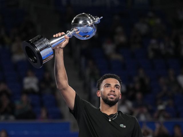 Arthur Fils with Tokio's trophy